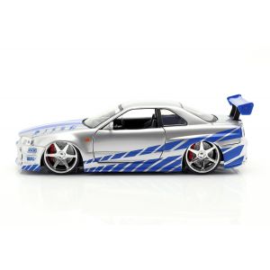 Fast & Furious Brian`s Nissan Skyline GT-R (R34) argent/bleu 1/24
